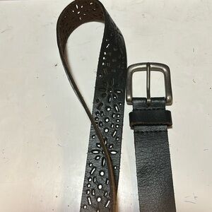 Black leather belt with suede inside. Unique cutout design. “Like new”condition.